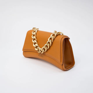 A tan leather shoulder bag with a gold chain strap, shown on a clean white background
