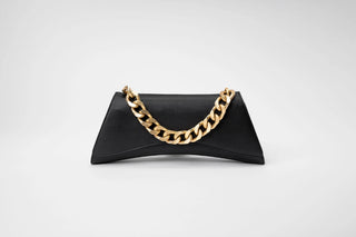 A black leather clutch bag with a distinctive curved bottom edge.