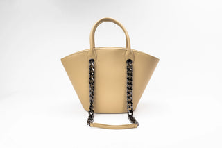 A light beige leather handbag with a wide, flared silhouette, double top handles.